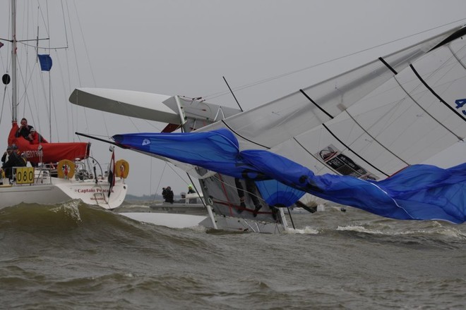 Medal race. Leigh McMillan and Will Howden (GBR) capsizing just after the finish of the Medal Race in the Tornado class - Delta LLoyd Regatta 2008 ©  SW